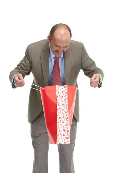 Businessman and paper bag — Stock Photo, Image