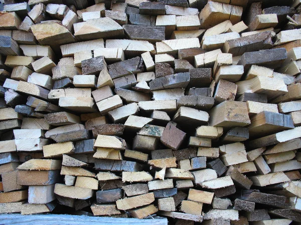 Fond de bûches de bois de chauffage hachées à sec en pile — Photo