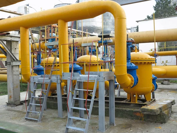 Natural gas station with yellow pipes power plant — Stock Photo, Image