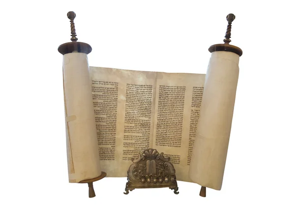 The Jewish Torah scroll and a gold menorah candle support isolat Stock Picture