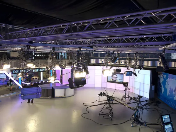 Television studio equipment, spotlight truss and professional ca Stock Photo