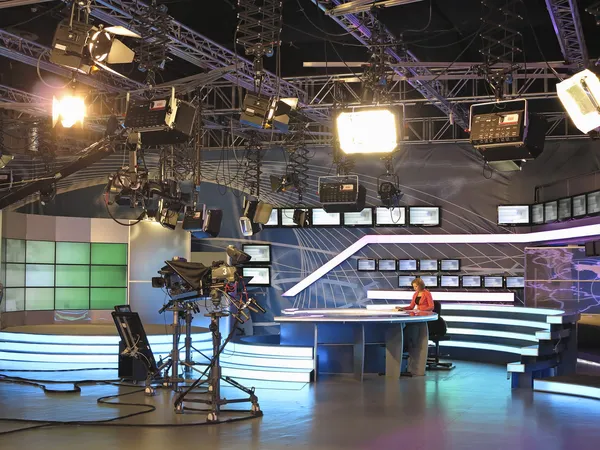 Television studio equipment, spotlight truss and professional ca Royalty Free Stock Images