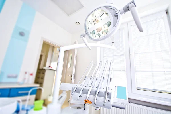 Professional Dentist tools in the dental office. Dental Hygiene and Health conceptual image.