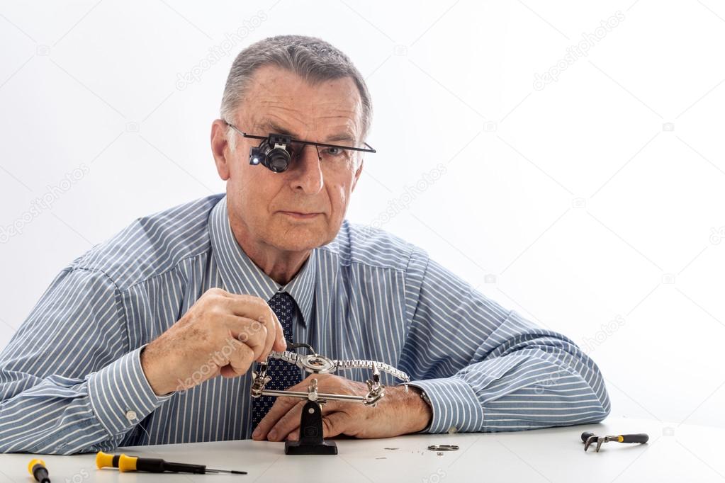 Watchmaker on White Background