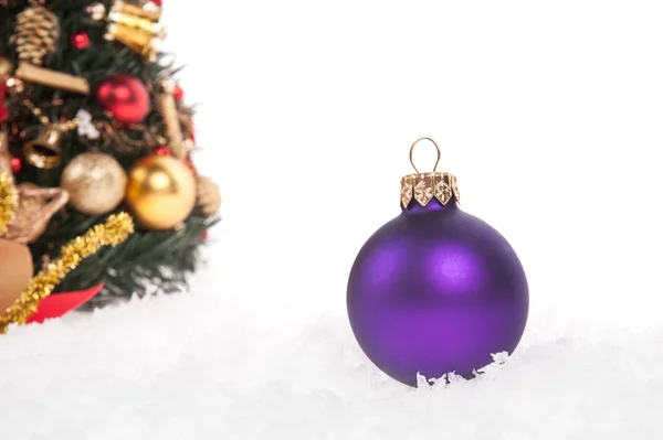 Christmas ball with snow on white background — Stock Photo, Image