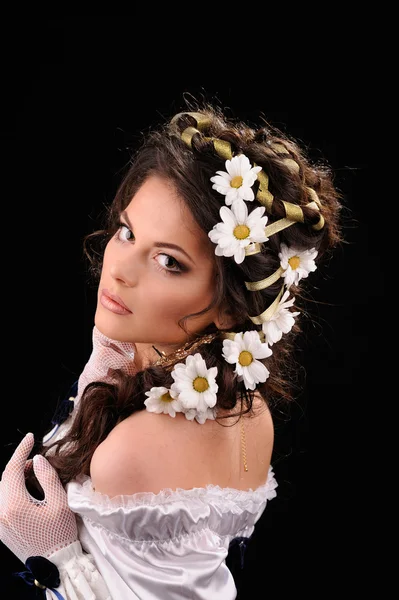 Sexy girl with chamomile in the hair — Stock Photo, Image