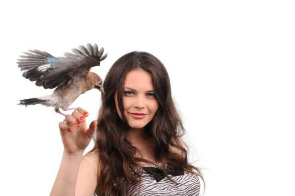 Retrato de menina sorridente com pássaro na mão — Fotografia de Stock