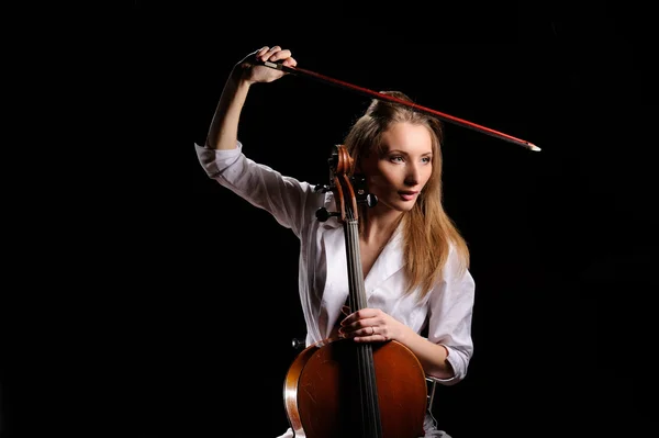 Attractive girl with cello isolated over black background — Stock Photo, Image