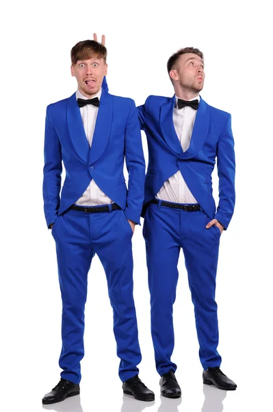 Funny men dressed in blue suite with different emotions — Stock Photo, Image