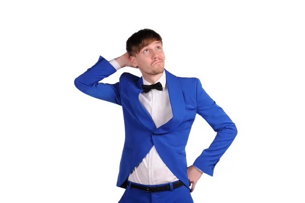 Uomo divertente in suite blu con su sfondo bianco — Foto Stock