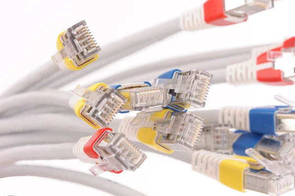 Computer network cables over grey background — Stock Photo, Image