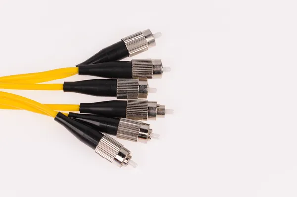 Fiber optic cables isolated on grey background — Stock Photo, Image