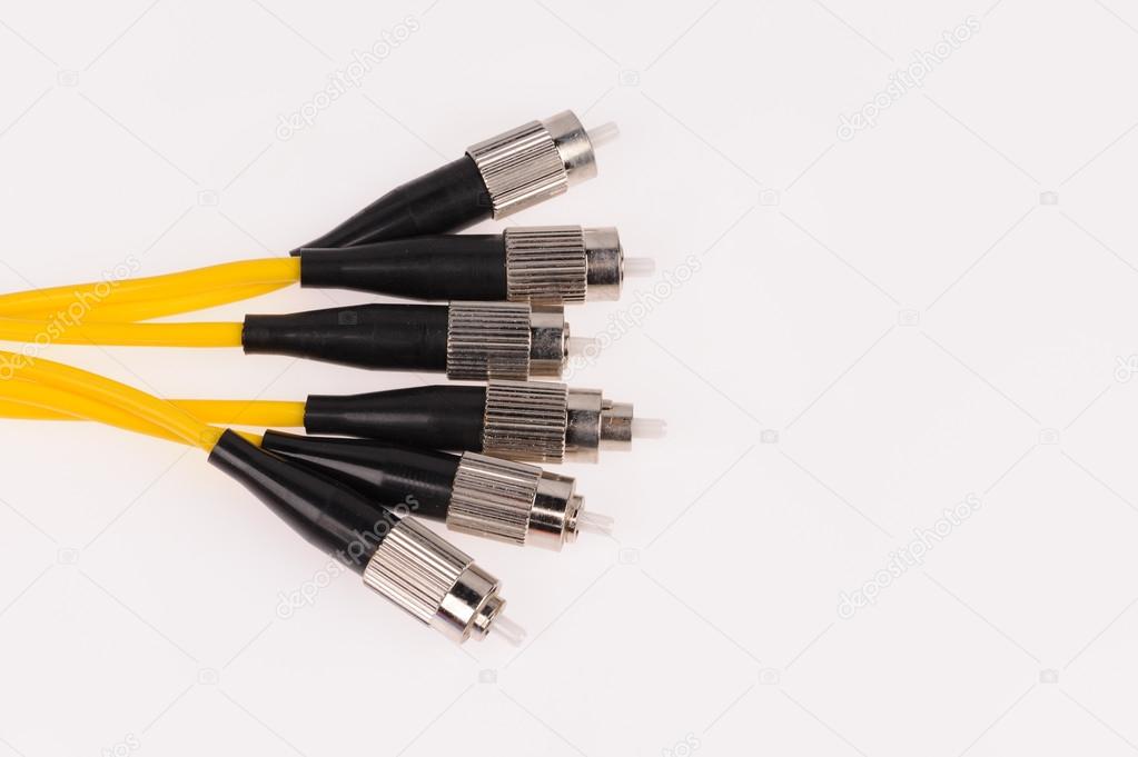 Fiber optic cables isolated on grey background