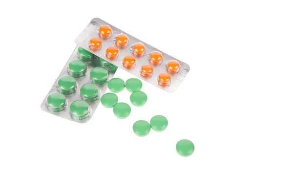 Embalagem de comprimidos e blister aberto isolado sobre fundo branco — Fotografia de Stock