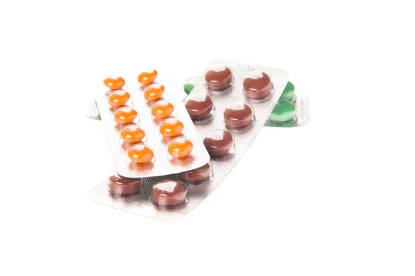 Krabičku pilulek izolovaných na bílém pozadí — Stock fotografie