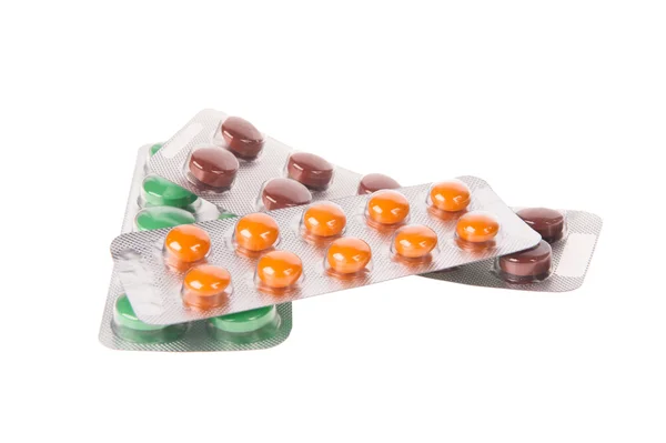 Packung Pillen isoliert über weißem Hintergrund — Stockfoto