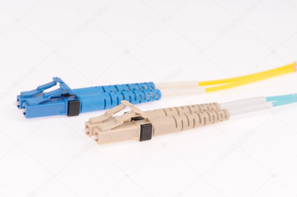 Fiber optic cables isolated on grey background
