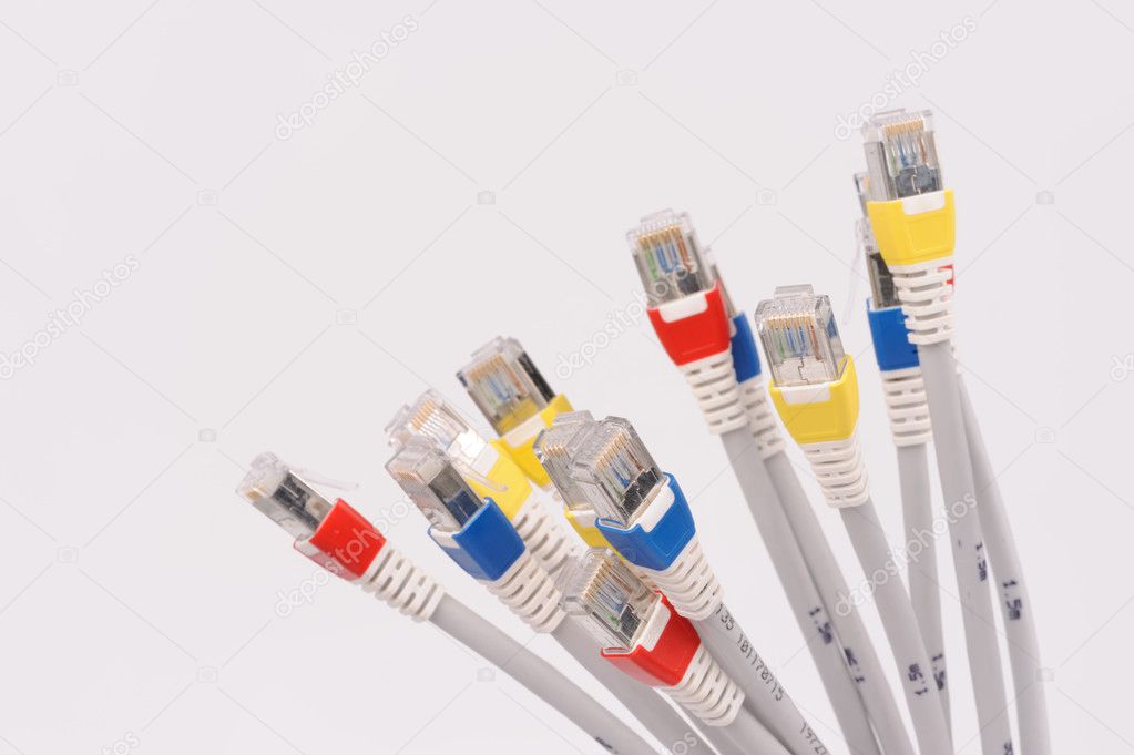 computer network cables over grey background 