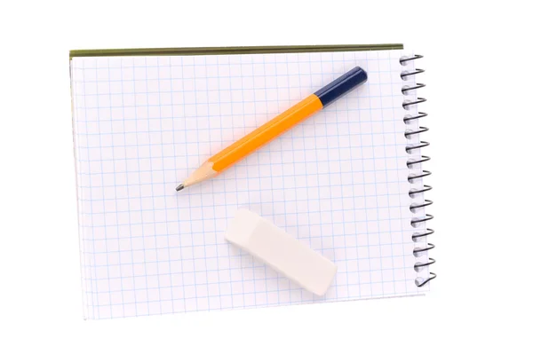 Bloco de notas com lápis e borracha — Fotografia de Stock