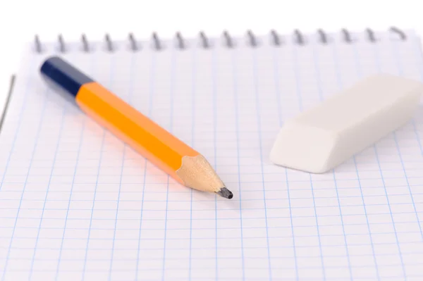 Notepad with pencil and eraser — Stock Photo, Image