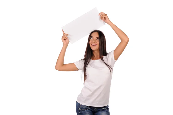Beautiful girl holding a blank billboard — Stock Photo, Image
