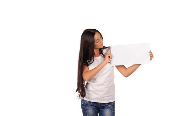 Beautiful girl holding a blank billboard — Stock Photo, Image