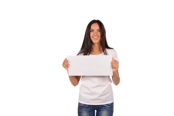 Beautiful girl holding a blank billboard — Stock Photo, Image