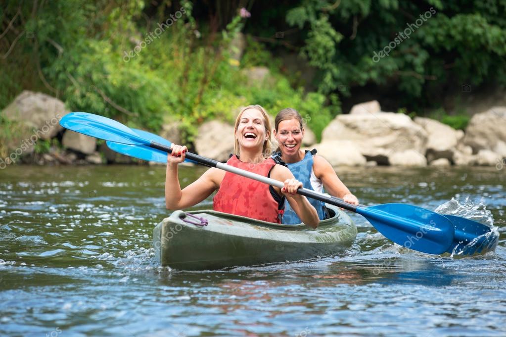 Women kayaking Stock Photo by ©Corepics 31412845
