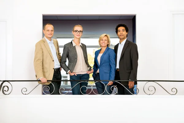 Project team on balcony — Stock fotografie