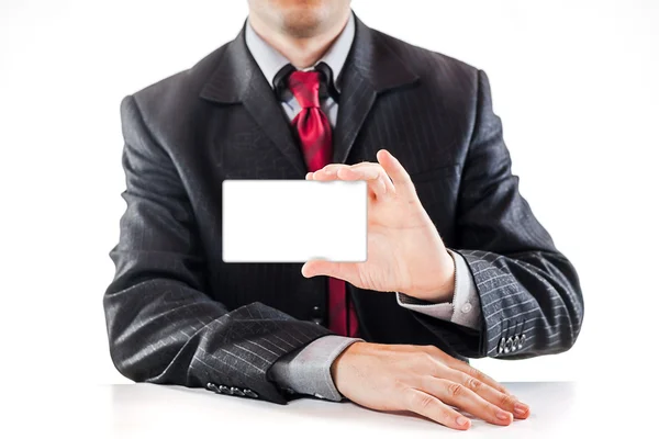 Close up of a business man showing a blank business card — Stock Photo, Image