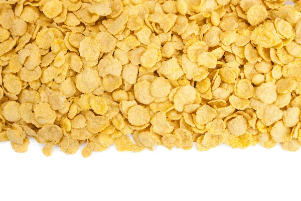 Granen cornflakes op witte achtergrond — Stockfoto