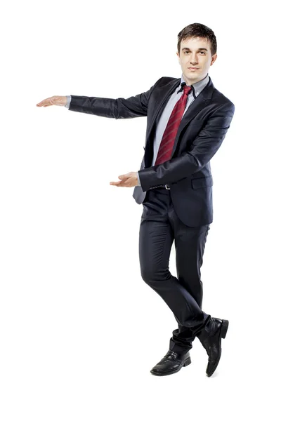 Attractive young business man with laptop on white background — Stock Photo, Image