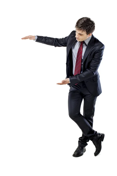 Attractive young business man with laptop on white background — Stock Photo, Image