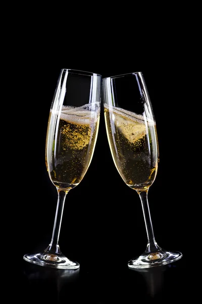 Champagne glasses on black backgorund — Stock Photo, Image