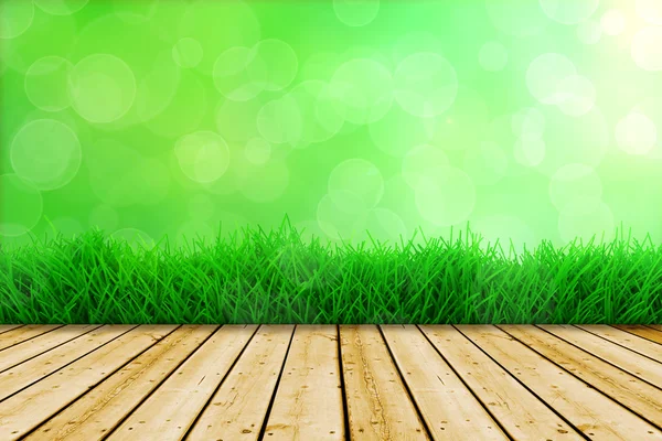 Sfondo con erba fresca verde e pavimento in legno — Foto Stock