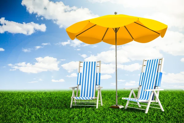 Sun loungers and umbrella — Stock Photo, Image