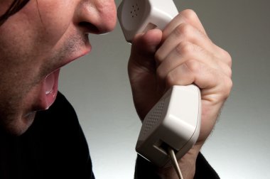 Man screaming on the phone clipart