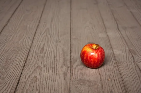 Apple on table — Stock Photo, Image