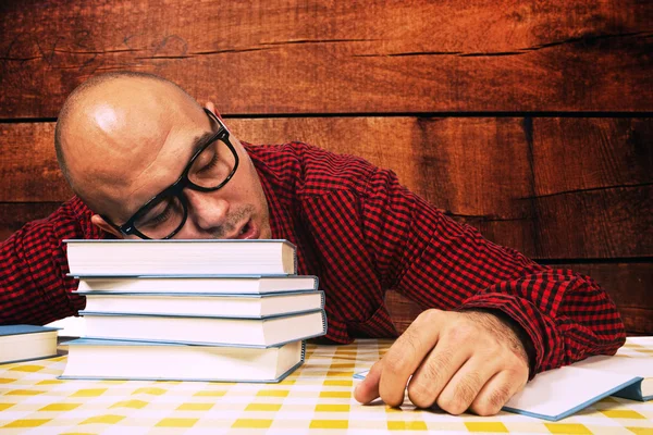 Student sleeping on books — Stock Photo, Image