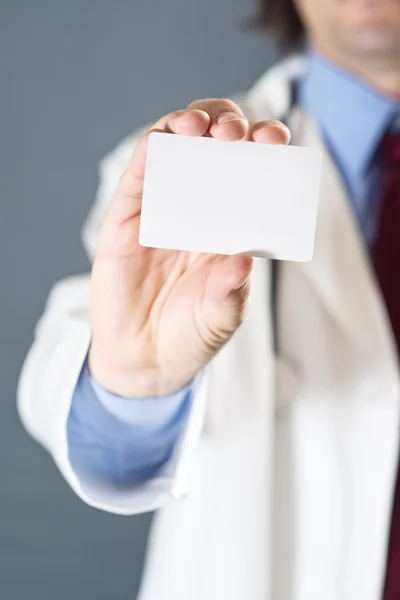 Doctor with business card — Stock Photo, Image