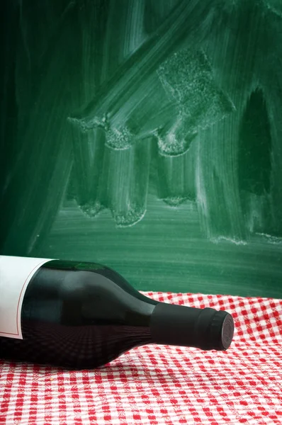 Wine bottle on a restaurant table — Stock Photo, Image