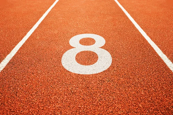 Number eight on running track — Stock Photo, Image