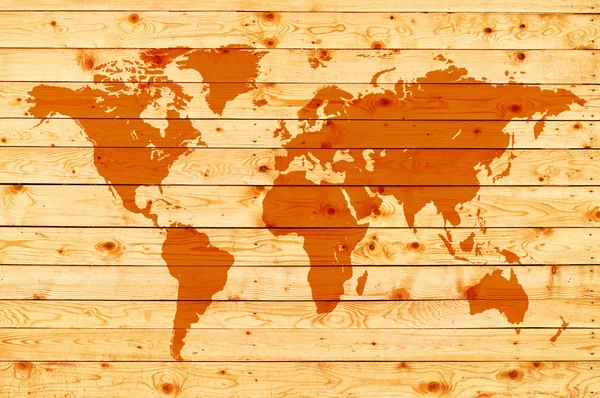 Mapa del mundo sobre fondo de madera — Foto de Stock