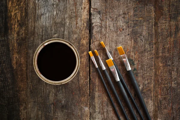 Paint brushes and can — Stock Photo, Image