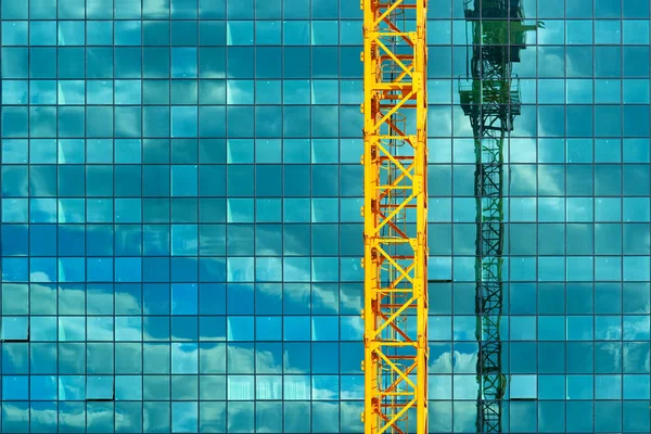 Construction crane and office building — Stock Photo, Image