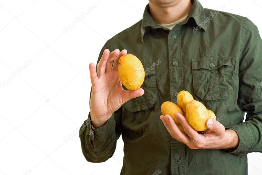 Farmer holding potato