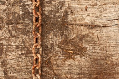 paslı zinciri ve yıpranmış ahşap arka plan