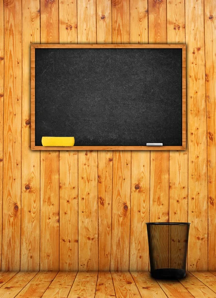 Black chalkboard in classroom — Stock Photo, Image