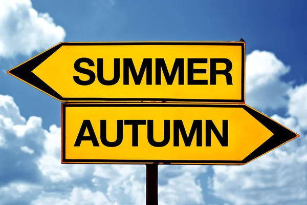 Summer or autumn opposite signs — Stock Photo, Image
