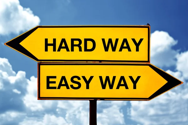 Hard way or easy way, opposite signs — Stock Photo, Image